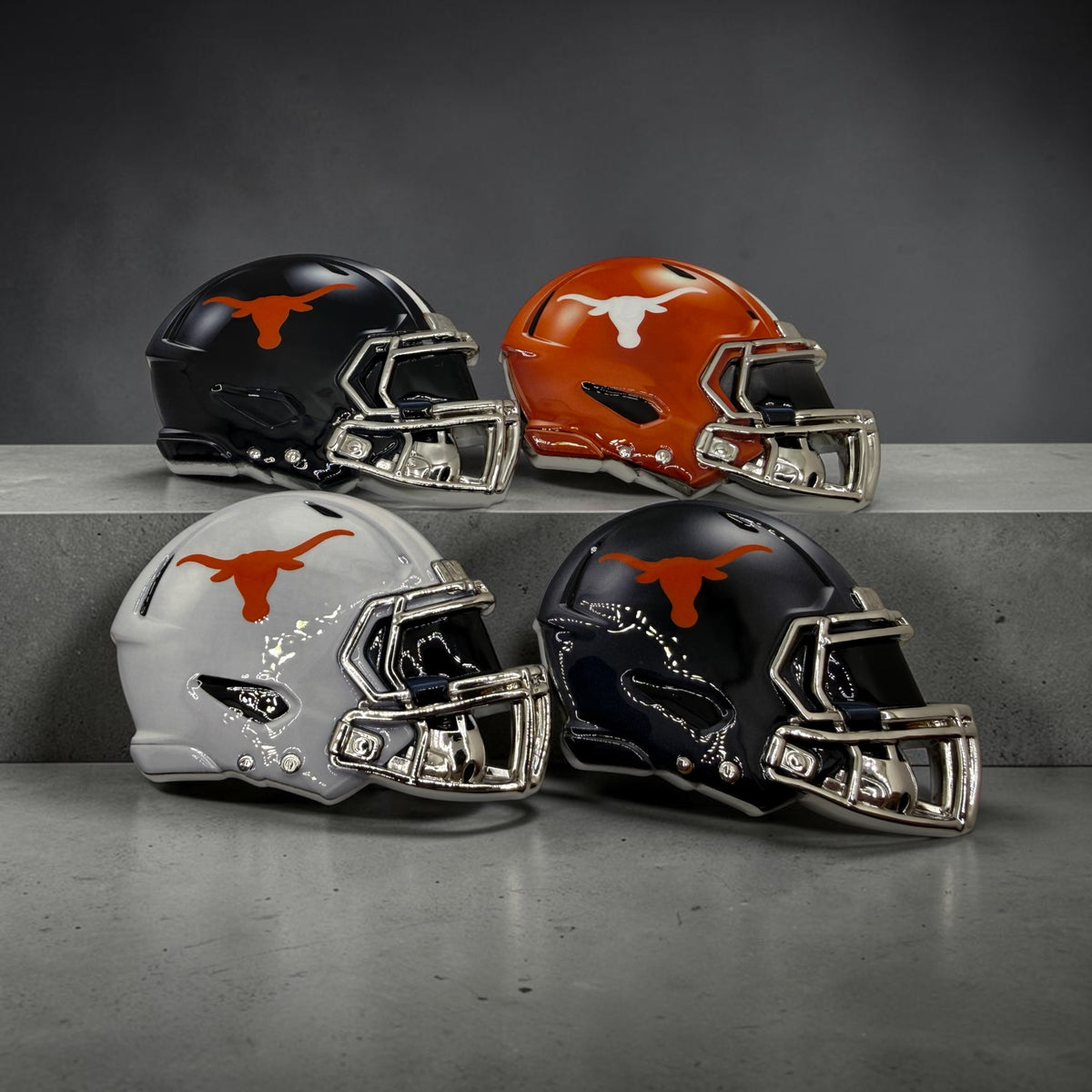 Hook’ Em longhorn mini helmets