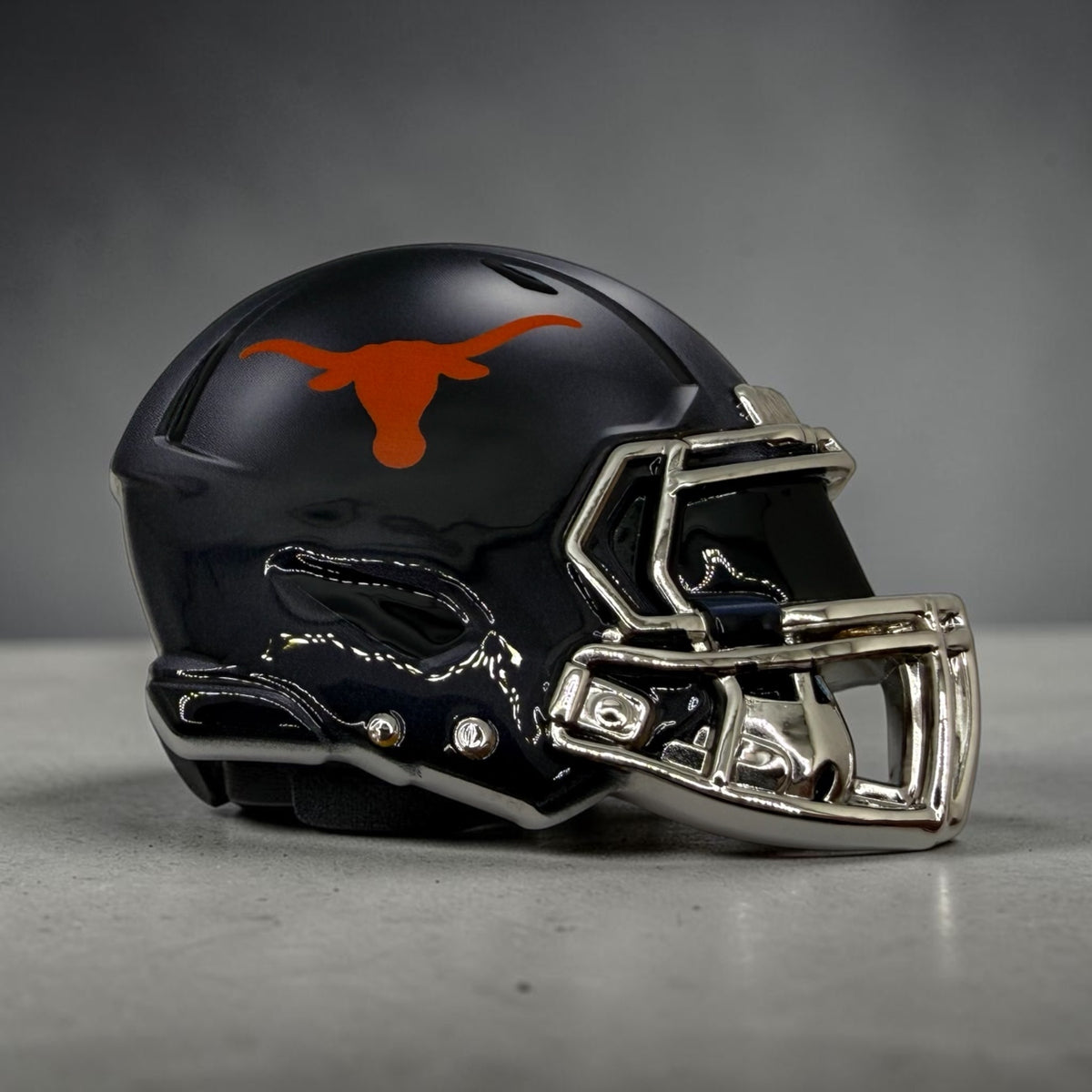 Hook’ Em longhorn mini helmets