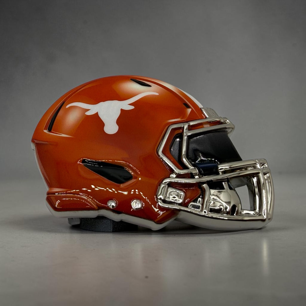 Hook’ Em longhorn mini helmets