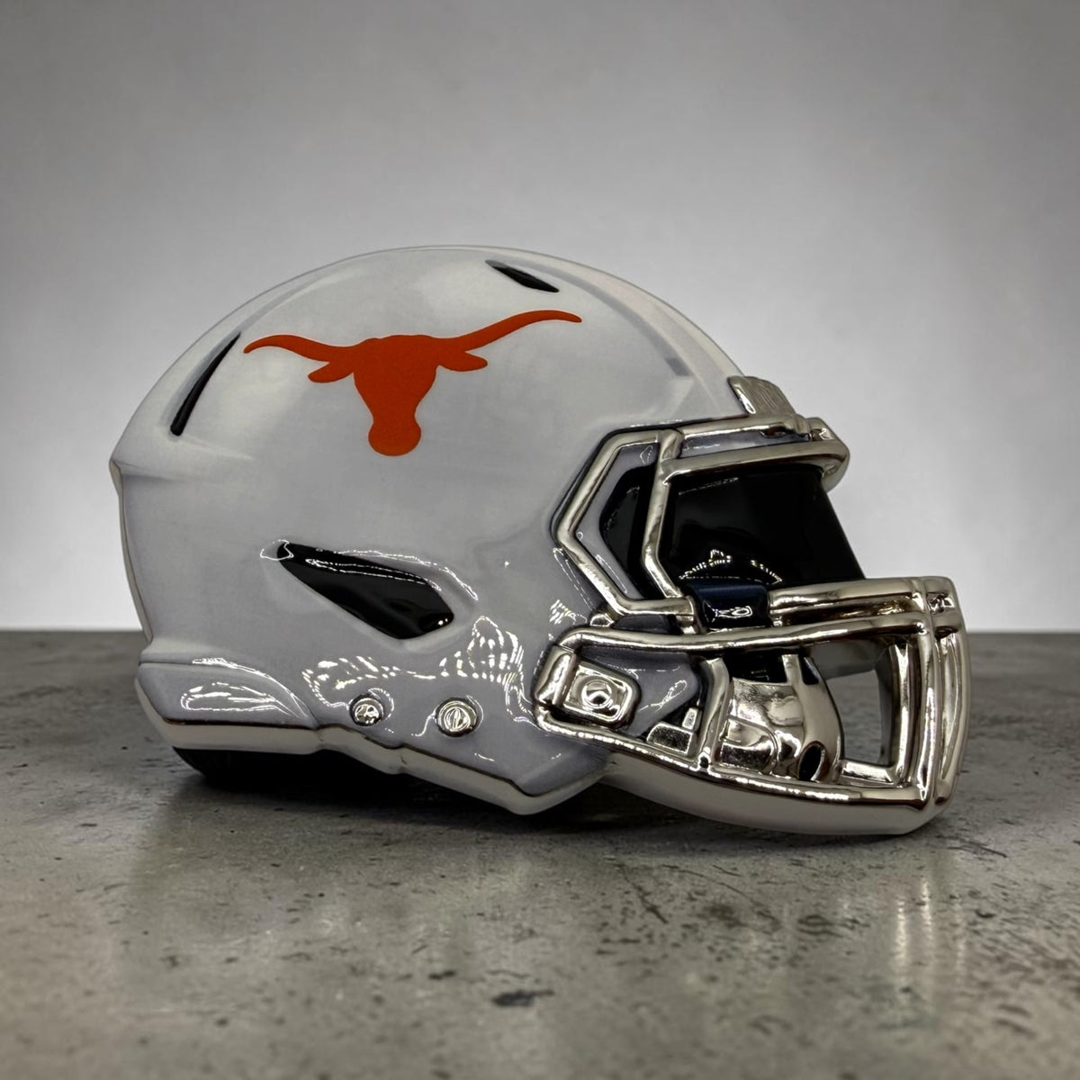 Hook’ Em longhorn mini helmets