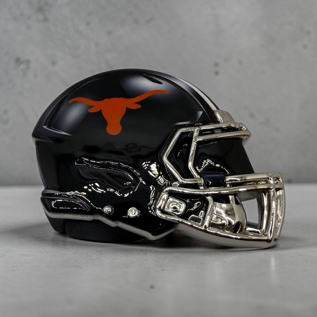 Hook’ Em longhorn mini helmets