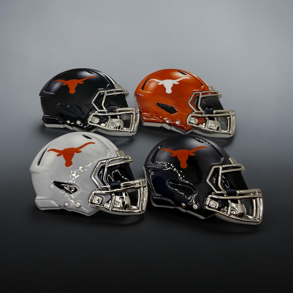 Hook’ Em longhorn mini helmets